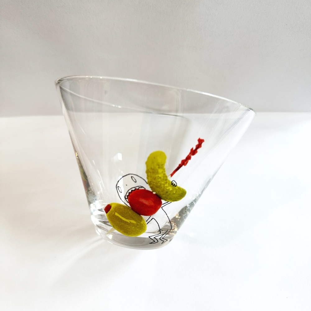CB2 Oliver cocktail glass: olive, pickle, tomato on toothpick